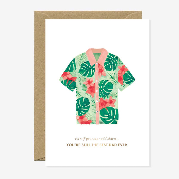 Greeting card showing a tropical shirt with green monstera leaves and red hibiscus, symbolizing dad’s quirky fashion and playful Father’s Day humor.