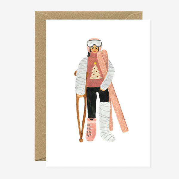 Illustration of a woman in ski gear with a humorous expression, holding ski poles, and wearing a sweater with a Christmas tree design. She has ski boots on her feet, which are styled to look like they are on the ground covered in snow.