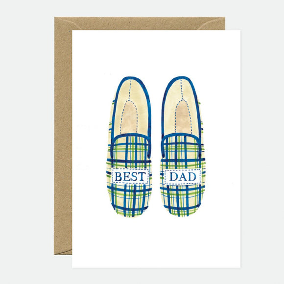 A greeting card with a illustration of checkered slippers and the text 'BEST DAD' on the upper part. Accompanied by a brown envelope.