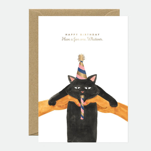 A birthday greeting card featuring a black cat with a party hat, accompanied by a brown envelope.