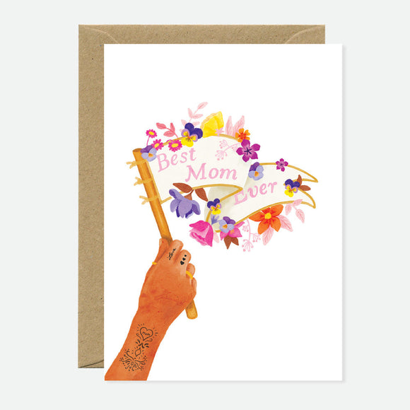 Greeting card with an illustration of a hand holding a banner that reads 'Best Mom Ever' with floral elements and a space for a personalized message.