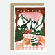 Illustration of two hands holding mugs on a checkered blanket, with snowy mountains, pine trees, and a wooden canopy in the background.