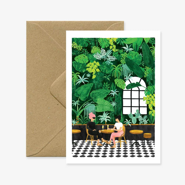 A greeting card with an illustration of a person sitting in a room filled with green plants, accompanied by a brown envelope.