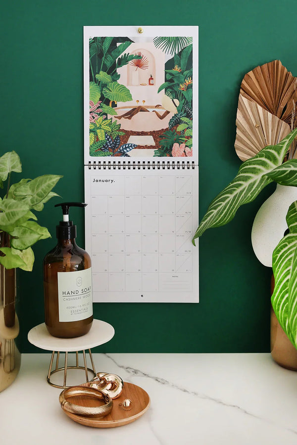 Inside view of Travel Bucket List 2026 calendar by All The Ways To Say showing January page – tropical bath scene