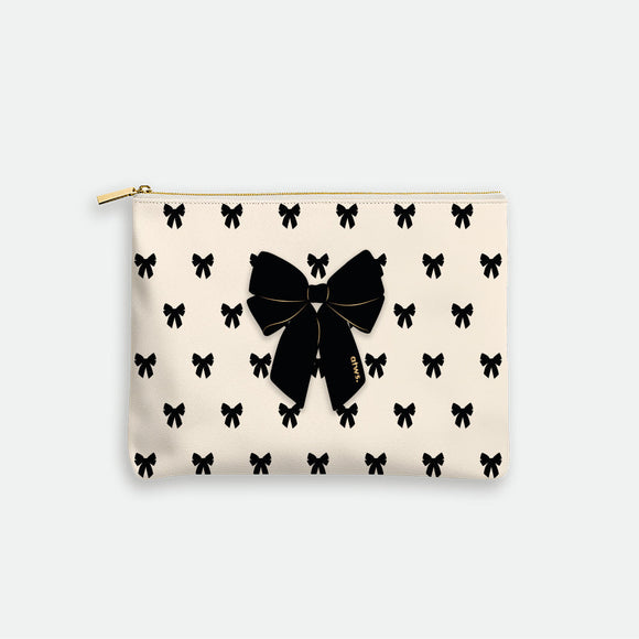 black bow cream pouch bag by All The Ways To Say