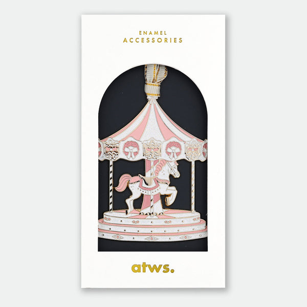 XMAS Merry Go Round Ornament by All the Ways to Say shaped like a pink carousel with horse, hand painted enamel Christmas decoration.