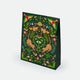 Green Jungle Gift Bag by All the Ways to Say featuring tropical design with leopards, monkeys and foliage on matte coated cardstock, available in two sizes.