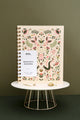 Full front view of Pink Croco monthly planner standing on display with cover design visible