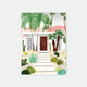 Decorative notebook cover with palm trees, cacti, and a building design.