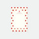 A notepad with a white background and a border of red hearts. The notepad has text at the top which seems to be a brand or product name.