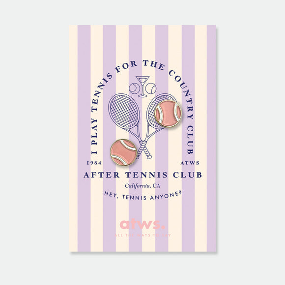Balle de Match enamel pins by All the Ways to Say featuring pastel tennis balls with gold-plated details on striped purple and cream background.