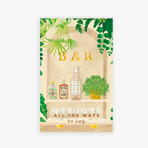 Rosé All Day enamel pin by All the Ways to Say featuring pink wine bottle design with gold-plated details on illustrated home bar background.