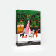 Dog Sitter jigsaw puzzle by All the Ways to Say – stylish woman walking six dogs in a lush green city street with coffee cup in hand.