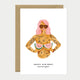 A bold greeting card by All The Ways To Say featuring a watercolor illustration of a tattooed woman with pink hair holding watermelon slices with the text "HAPPY BIRTHDAY summer queen".