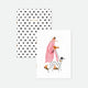 A set of two A6 pocket notebooks by All The Ways To Say: one with a black heart pattern and gold foil, the other featuring a woman walking a Dalmatian.