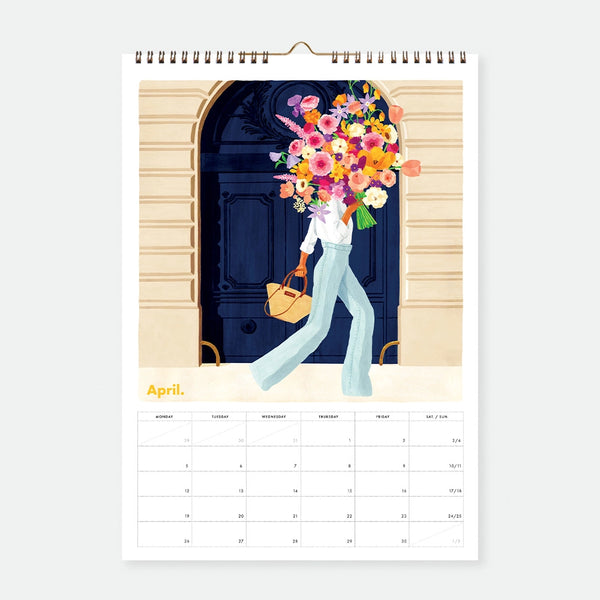 April page of the Best Of 10 Years 2027 calendar, illustrated woman carrying an oversized flower bouquet through a blue doorway