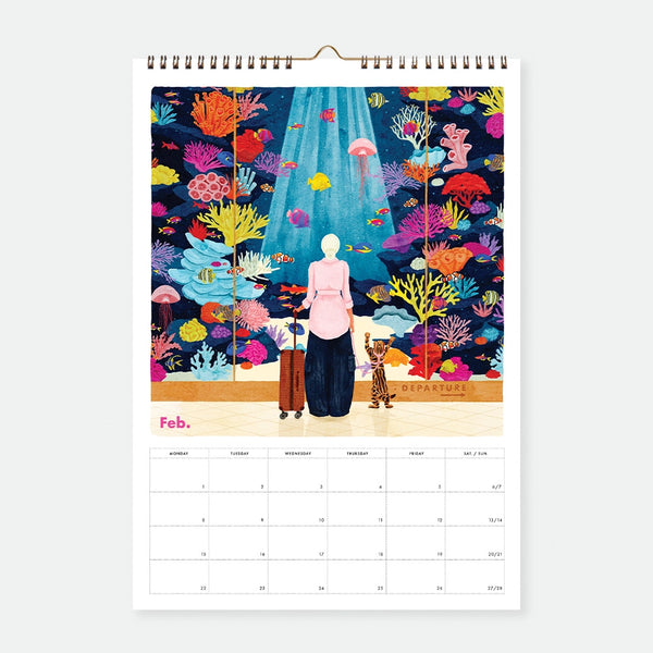 February page of the Best Of 10 Years 2027 calendar, illustrated woman and cat at an airport departure gate surrounded by colorful coral reef