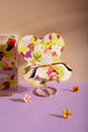 Spring Sweets Clip Case - Inside view of the open floral glasses case showing its unique flower shape and the glasses inside.