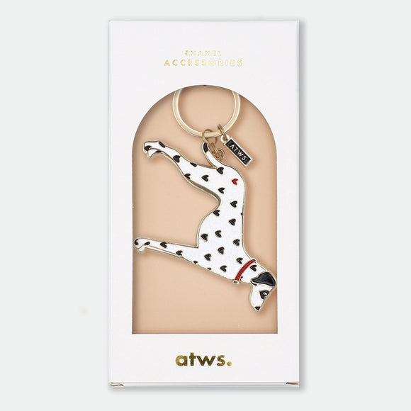 Enamel and metal keychain of a dalmatian leaping mid-air, white with black heart-shaped spots and one red heart, red collar, gold-tone ring and "ATWS" charm