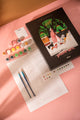 Dog Sitter paint by numbers kit with black box, numbered canvas, 15 paint pots, two brushes, color chart and instructions