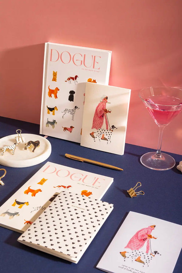 DOGUE - Collection: multiple dog-themed notebooks including illustrations of poodles and dalmatians with chic accessories.