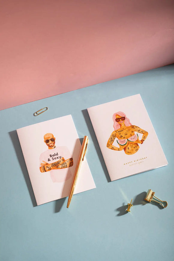 Bald and sexy Greeting card - Lifestyle composition with hand-painted tattooed characters and gold office accessories.