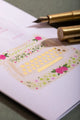 Love you mum typewriter Greeting card - Close-up on the hand-painted typewriter illustration and pink flowers.