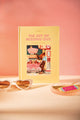 Yellow "Jomo, the joy of missing out" A5 hardcover notebook with a California diner illustration, next to heart sunglasses