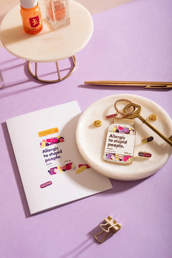 Allergic to stupid people Keychain - Lifestyle view with matching greeting card and gold stationery.