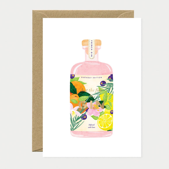 Illustrated birthday greeting card of a pink gin bottle labeled "Birthday Edition," decorated with oranges, lemons, blueberries, and flowers, with gold foil text reading "Let the fun be GIN" and "Infused with love"