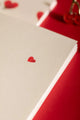 Notebook A5 New Hearts - Interior view of the white pages featuring a small red heart detail.