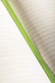 The art of not going out Hardcover Notebook A5 - Interior view of the premium lined paper and green ribbon.