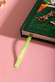 The art of not going out Hardcover Notebook A5 - Focus on the bright green satin ribbon bookmark.