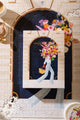 Parisian Door - Puzzle 1000 pieces: the illustrated product box placed directly over the completed 1000-piece puzzle.