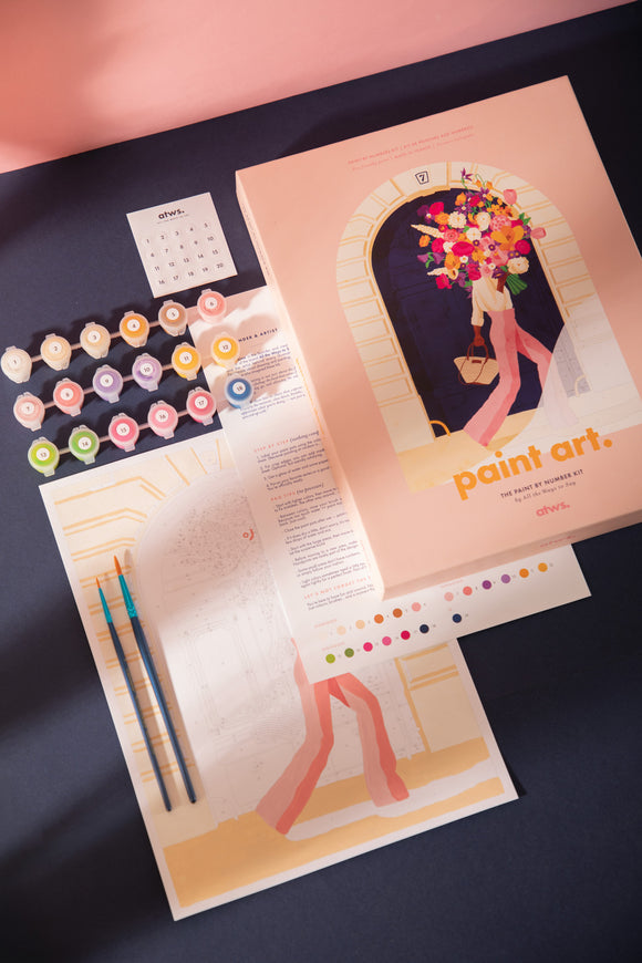 Parisian Door paint by numbers kit with pink box, canvas, numbered paint pots, two brushes, stickers and color chart