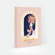 Parisian Door paint by numbers kit box by All The Ways To Say, illustration of a woman walking away from a blue Parisian doorway numbered 7, carrying a large bouquet of flowers and a woven basket, "paint art. The Paint By Number Kit by All The Ways To Say"