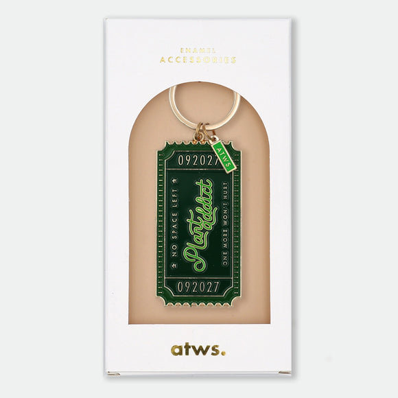 Enamel and metal keychain shaped like a vintage admission ticket, green with text reading "092027, Plant Addict, No space left, one more won't hurt," gold-tone ring and "ATWS" charm