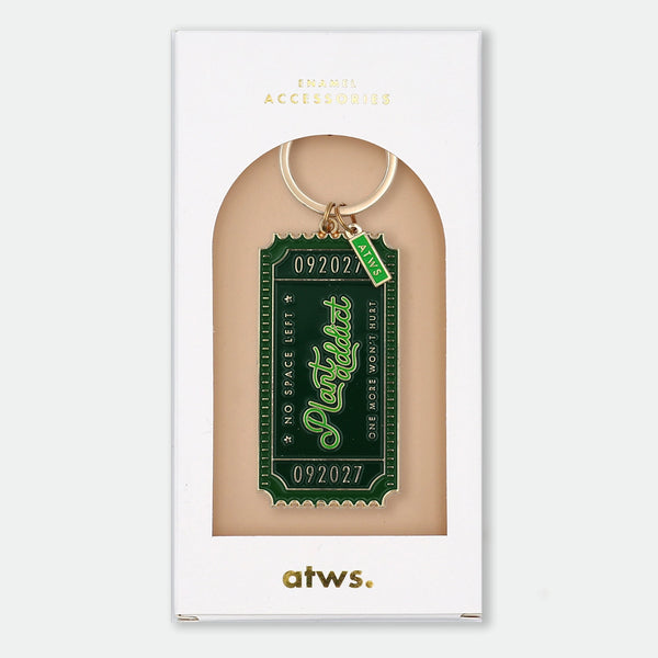 Enamel and metal keychain shaped like a vintage admission ticket, green with text reading "092027, Plant Addict, No space left, one more won't hurt," gold-tone ring and "ATWS" charm