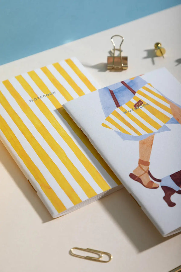 Summer Dachshund Pocket Notebook A6 DUO - Angled view showing both notebooks on a neutral background.