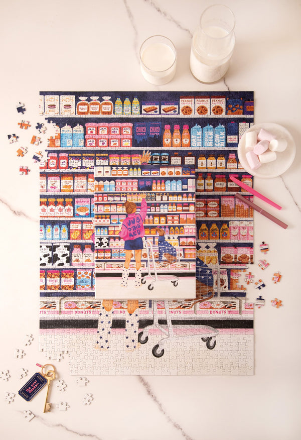 Sugar Market 1000 piece jigsaw puzzle and box, a girl in a pink jacket reaching for jam in a colorful grocery store aisle