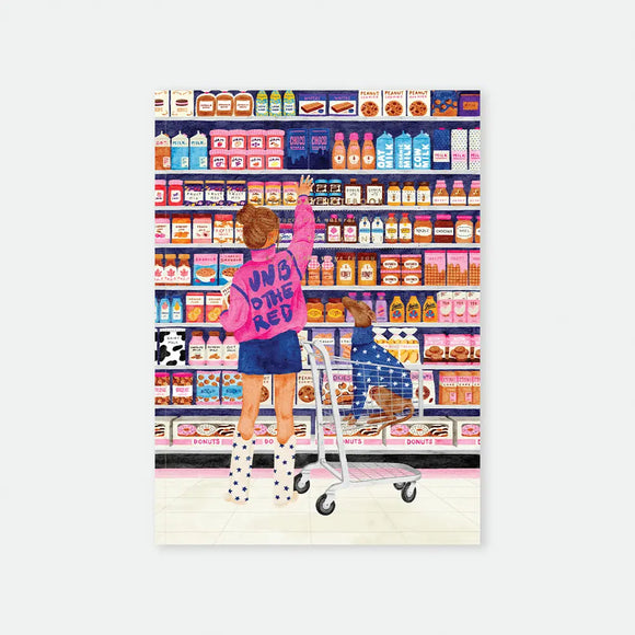 Sugar Market A5 notebook cover by All The Ways To Say, illustration of a girl reaching for a jar on a grocery store shelf with her dog waiting in the cart, shelves stocked with jams, milk and cookies, "UNBOTHERED" text on her jacket
