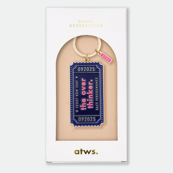 Enamel and metal keychain shaped like a vintage show ticket, navy with pink text reading "092025, Front Row Seat, The Overthinker, 24/7 Performance," gold-tone ring and "ATWS" charm